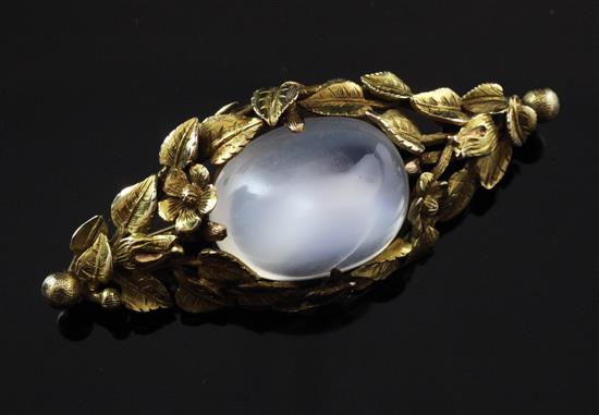 A 14ct gold and cabochon moonstone set brooch, approx. 2in.